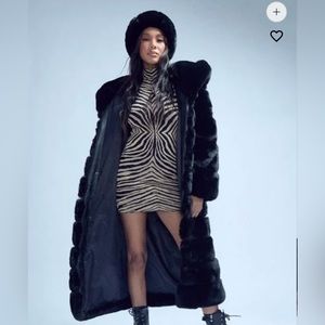 Akira’s black full length faux fur coat with hood